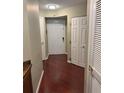 Inviting entrance foyer featuring hardwood floors and ample closet space at 795 Hammond Dr # 1712, Atlanta, GA 30328