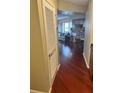 Hallway with wood floors leading to the kitchen and living room at 795 Hammond Dr # 1712, Atlanta, GA 30328