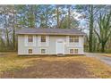 Charming one-story home with a well-manicured lawn and inviting curb appeal at 6605 Black Bend Ct, Riverdale, GA 30274