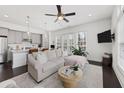 Open floor plan with living room seamlessly connected to the modern kitchen at 6711 Cadence Blvd, Atlanta, GA 30328