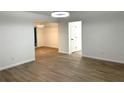 Open-concept living room with modern floors and neutral color palette at 5729 Rock Rd, Union City, GA 30291