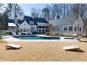 An in-ground pool sits in the backyard with ample lawn and outdoor recreation space at 4000 Conway Valley Nw Rd, Atlanta, GA 30327