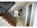 Hallway with stairway leading to the kitchen and bathroom at 2660 Evans Ml, Lithonia, GA 30058