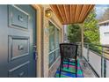 Cozy balcony with seating area, perfect for relaxing outdoors at 3048 Briarcliff Ne Rd # 2, Atlanta, GA 30329
