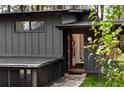 Inviting front entrance featuring a stone path, open doorway, and modern design elements at 3637 Eaglerock Dr, Atlanta, GA 30340