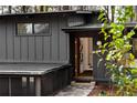 Inviting front entrance featuring a stone path, open doorway, and modern design elements at 3637 Eaglerock Dr, Atlanta, GA 30340