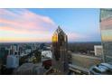 Stunning aerial view of skyscrapers highlighting the city skyline at dusk at 75 14Th Ne St # 3820, Atlanta, GA 30309
