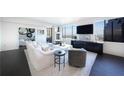 Stylish living room with comfortable seating and a view of the city skyline at 75 14Th Ne St # 3820, Atlanta, GA 30309