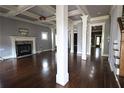 Spacious living room with hardwood floors, fireplace, and coffered ceiling at 2313 Bouldercliff Way, Atlanta, GA 30316