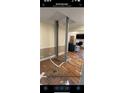 Elevator during install, showcasing open layout with hardwood floors and neutral wall colors at 1406 Winston Pl, Decatur, GA 30033
