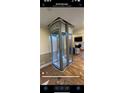 Modern home elevator for accessibility, featuring sleek design and integrated lighting at 1406 Winston Pl, Decatur, GA 30033