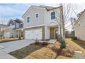 Beautiful two-story home with a stone-accented garage and well-maintained lawn at 2777 Aralynn Way, College Park, GA 30337