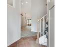 Inviting home foyer featuring tile floors and a view into the living room at 120 Arrowood Ln, Alpharetta, GA 30009