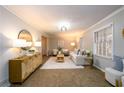 Bright living room with neutral paint, ample seating and lots of natural light at 3710 Oregon Trl, Decatur, GA 30032