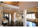 Bright and airy foyer featuring hardwood floors, high ceilings, and elegant architectural details at 1365 Willis Lake Dr, Kennesaw, GA 30152