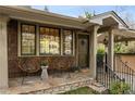 Inviting front porch with stylish seating and a charming entrance to the home at 630 Oakdale Ne Rd, Atlanta, GA 30307