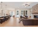 Open-concept layout with a living room flowing into a kitchen and office area at 472 Price Rd, Carrollton, GA 30116