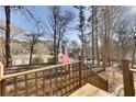 Front yard view showing the property and neighborhood, accentuated by an American flag at 2731 Tritt Springs Ne Dr, Marietta, GA 30062