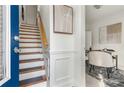 Bright entryway with hardwood stairs and modern office space at 201 16Th Nw St # 4, Atlanta, GA 30363