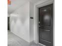 Hallway view to the front door of unit 613 at 3040 Peachtree Nw Rd # 613, Atlanta, GA 30305