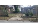 Fenced in yard that needs some attention at 540 Langhorn Sw St, Atlanta, GA 30310