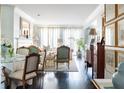 Bright living room featuring hardwood floors, large windows and elegant furnishings at 2525 Peachtree Ne Rd # 25, Atlanta, GA 30305