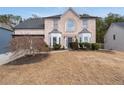 Beautiful exterior view of home featuring a manicured lawn and brick facade at 2971 Montview Sw Dr, Marietta, GA 30060