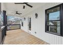 Outdoor balcony with modern black trim, ceiling fans, and ample space for relaxation at 727 Garibaldi Sw St, Atlanta, GA 30310