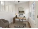 Cozy home office featuring a live edge desk, natural light, and neutral color palette at 1908 Variations Ne Dr, Atlanta, GA 30329