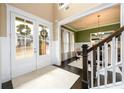 Inviting entryway showcasing the home's interior design and open-concept floor plan at 411 Ridgeway Ln, Canton, GA 30114