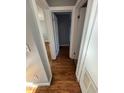 Hallway with hardwood floors, connecting various rooms in the house at 571 Formwalt Sw St # 7, Atlanta, GA 30312