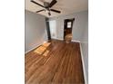 Open living room with ceiling fan and hardwood floors, offering a cozy space at 571 Formwalt Sw St # 7, Atlanta, GA 30312