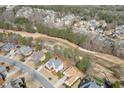 Overhead view of a home near a golf course highlighting the property's location in a residential community at 3835 Greenside Ct, Dacula, GA 30019