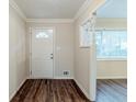 Bright entryway featuring hardwood floors, fresh white paint, and a charming view into the spacious living area at 2916 Lloyd Rd, Decatur, GA 30034
