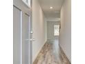 Inviting entryway featuring durable flooring, a neutral color scheme, and access to the living area at 324 Shine Dr, Stockbridge, GA 30281