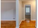A view of the entryway boasting hardwood floors and soothing light gray painted walls at 3368 Windsor Castle Ct, Decatur, GA 30034