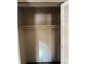 Interior of an empty closet with shelving providing plenty of storage space at 4707 Mariners Way, Stone Mountain, GA 30083