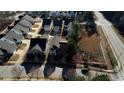 Aerial view of the neighborhood showcasing the home's location near a park and roadways at 5114 Arnold St, Covington, GA 30014
