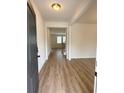 The foyer leads into a house with hardwood floors and a staircase at 1847 Kingsmere Run Dr, Loganville, GA 30052