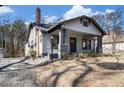 Quaint home featuring a chimney and covered front porch at 2265 Perkerson Sw Rd, Atlanta, GA 30315