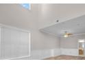 Bright living room with high ceilings, large windows, and elegant trim at 4879 Pinnacle Dr, Stone Mountain, GA 30088