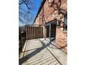 Spacious balcony area overlooking the neighborhood, complete with secure fencing and a sliding door at 3125 Colonial Way # H, Atlanta, GA 30341