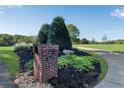 Brick mailbox with the house number surrounded by landscaping at 1525 Thomas Rd, Canton, GA 30115