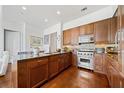 Gourmet kitchen features granite countertops, stainless steel fixtures and modern appliances at 3630 Peachtree Ne Rd # 1809, Atlanta, GA 30326