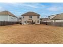 Expansive backyard featuring a well-maintained lawn, offering ample space for outdoor activities at 4480 Sunflower Cir, Cumming, GA 30040