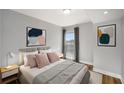 Cozy bedroom featuring a plush bed, soft lighting, and modern decor at 199 14Th Ne St # 2407, Atlanta, GA 30309
