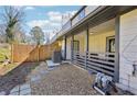 Covered back porch, perfect for relaxing and entertaining with easy access to the backyard at 8 Pine Canyon Sw Dr, Atlanta, GA 30331