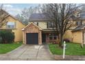 View of the house's front facade, sidewalk and well-maintained lawn at 1042 Wedgewood Ct, Conyers, GA 30012