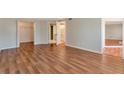 Spacious main bedroom with hardwood floors, walk-in closet, and en-suite bathroom at 4267 Parkview Ct, Stone Mountain, GA 30083