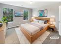 Comfortable bedroom featuring a spacious layout, natural lighting, and modern decor at 453 Inkberry Dr, Atlanta, GA 30349